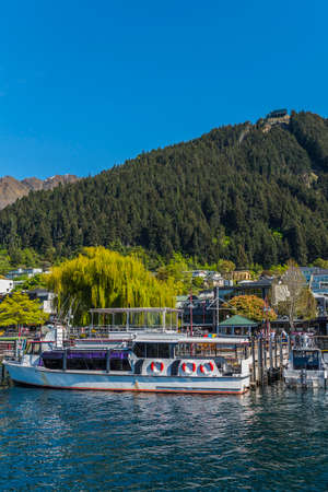 QUEENSTOWN, NEW ZEALAND - OCTOBER 10, 2018: Ship on the Wakatipu. Copy space for text. Verticalのeditorial素材