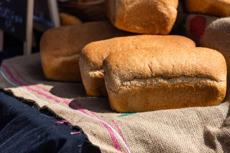 Fresh bread on the counter. With selective focus