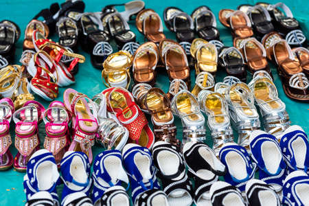 Indian shoes in the local market, Puttaparthi, Indiaの写真素材
