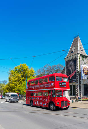 CHRISTCHURCH, NEW ZEALAND - OCTOBER 18, 2018: Double decker tourist bus. Vertical. Copy space for textのeditorial素材