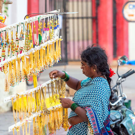 PUTTAPARTHI, INDIA - NOVEMBER 29, 2018: Indian jewelry in the local market. With selective focusのeditorial素材