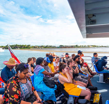NADI, FIDJI - JUNE 12, 2019: Group of tourists on a ship