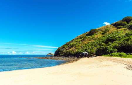 View of the sandy beach of the island, Fiji. Copy space for text