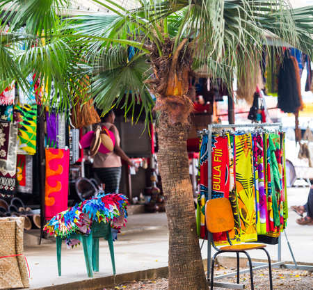 Multi-colored fabrics in the local market, Fiji. With selective focusの写真素材