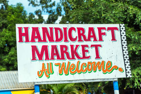 Wooden sign with the inscription "Handicraft Market", Fiji. With selective focus                    の写真素材