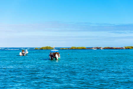 Boats near the shore, Galapagos Island, Isla Isabela. Copy space for text                                               の写真素材