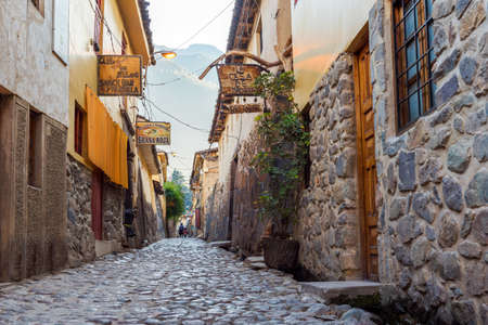 OLLANTAYTAMBO, PERU - JUNE 26, 2019: View of the narrow city street in the historical part of the cityのeditorial素材