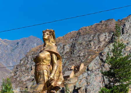 OLLANTAYTAMBO, PERU - JUNE 26, 2019: Golden Inca statue. With selective focusのeditorial素材