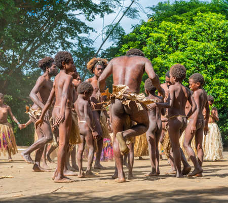 TANNA ISLAND, VANUATU - JULY 21, 2019: The tribe of the village of Yakel is dancing