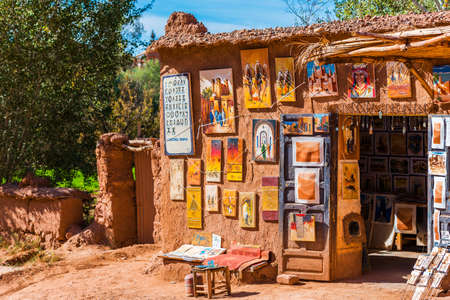 AIT-BEN-HADDOU, MOROCCO - NOVEMBER 12, 2019: Souvenir shop with goods on a city streetのeditorial素材