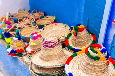 Moroccan hats in the store, Chefchaouen, Morocco. With selective focusの写真素材