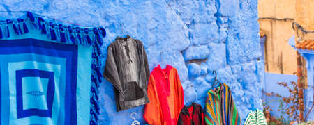 Selling clothes on a city street, Chefchaouen, Morocco