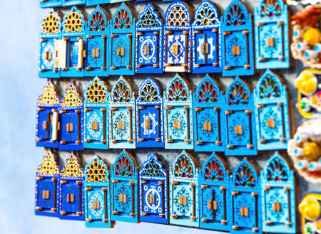 Carved wooden magnets, Chefchaouen, Morocco. With selective focusの写真素材