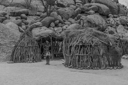 OKAUKUEJO, NAMIBIA - JANUARY 14, 2020: Okaukuejo resort with thatched roof houses and campsite in Etosha National Parkのeditorial素材