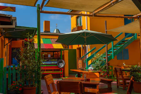 SWAKOPMUND, NAMIBIA - JAN 11, 2020: Street view with buildings in Swakopmund with colorful housesのeditorial素材