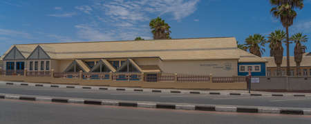 SWAKOPMUND, NAMIBIA - JAN 11, 2020: Street view with buildings in Swakopmund with colorful housesのeditorial素材