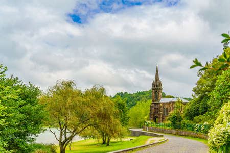 Church and buildings on the shore of Lagoa das Furnas, Sao Miguel, Azores Islands, Portugalの写真素材