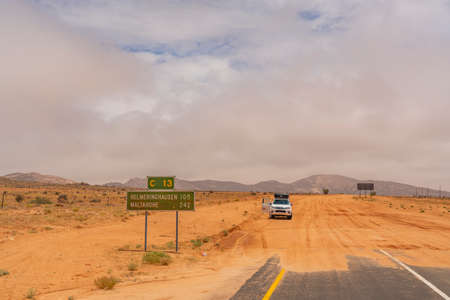 OUT. NAMIBIA - JAN. 04.2021: Road sign to Maltahoehe and Helminghausen in Namib-Naukluft National Park, Namibia.のeditorial素材