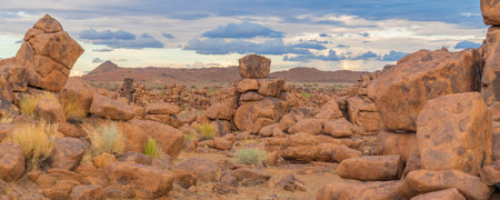 Massive Dolerite Rock Formations at Giant's Playground near Keetmanshoop, Namibia, Africa, background cloudy sky, panoramaの写真素材