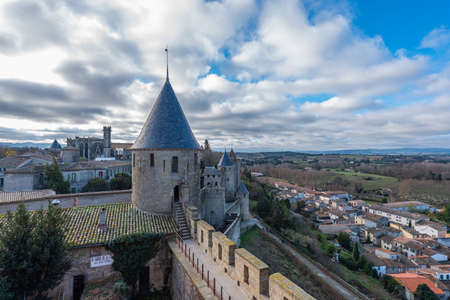 CARCASSONE, FRANCE - DECEMBER 28, 2019: View to the tower from the historical castle carcassone- cite de carcassone, background blue skyのeditorial素材