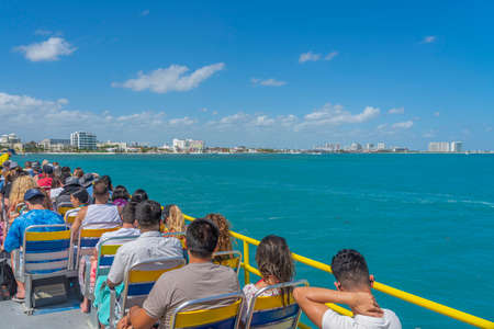 CANCUN, MEXIICO - MARCH 10.2021: Ultramar ferry leaving to Isla Mujeres, view from the boots deck to Hotel Zone Cancunのeditorial素材