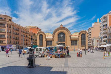 TARRAGONA, SPAIN - JUNE 23, 2021: View of the main facade of the historical Central Public Market of Tarragona, and the Corsini Square, in Tarragona, Spainのeditorial素材
