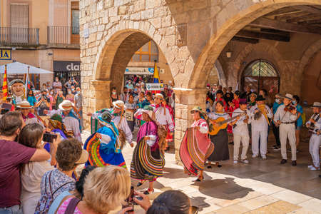 Folk dancers in Ecuador costumes at the folk festival Mayor in Montblanc Spainのeditorial素材