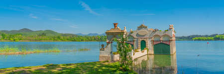 Landscape with a old boat house at the Lake of Banyoles in Girona, Catalonia, Spain, panoramaの写真素材