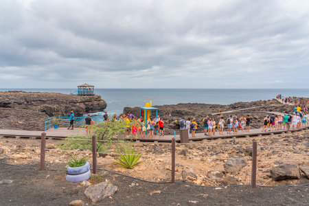 SAL ISLAND, CAPE VERDE - JUNE 22.2022: Buracona - The Blue Eye of Cabo Verde, people at the walking wayのeditorial素材