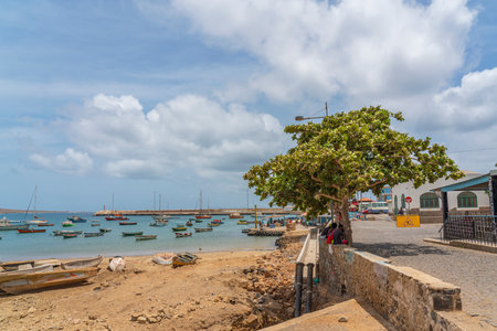 PALMEIRA, CAPE VERDE - JUNE 22.2022: Palmeira town view on Cape Verde Islands Sal with boats at the...