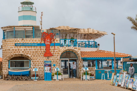 SANTA MARIA, CAPE VERDE, - JUNE 20.2022: Street view with a sea food restaurand in Santa Maria, Sal Island, Cape Verdeのeditorial素材