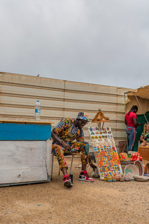 SANTA MARIA, CAPE VERDE, - JUNE 20.2022: Street view with a man selling souvenirs in Santa Maria, Sal Island, Cape Verdeのeditorial素材