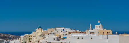 Panoramic view over Oia with traditional white houses, Santorini island, Greeceの写真素材