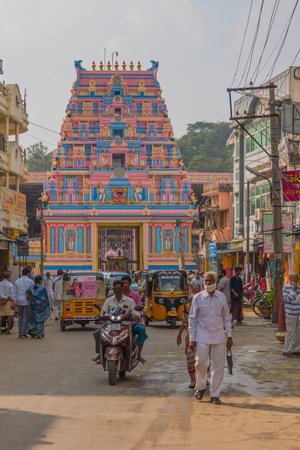 A street at Puttaparty, in background the entrance to the Sai Baba ashramのeditorial素材