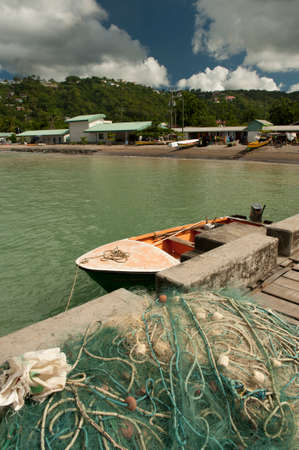 Fishermen beach and boat on a tropical caribbean islandのeditorial素材