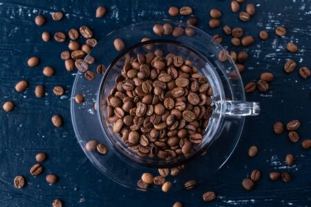 hole coffee beans in a cup