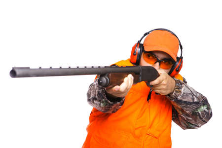 Hunter aiming a shotgun at prey, while wearing camouflage clothing, isolated on white