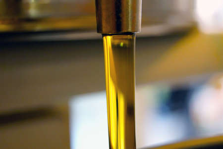 Close up shot of the crystal gold pure olive oil 