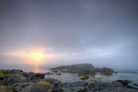 Early morning fog along the Atlantic coastline. の写真素材