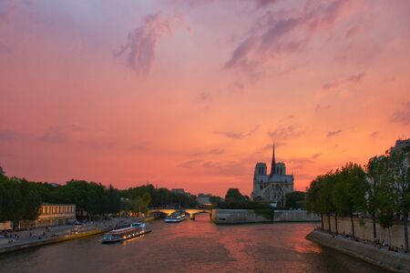 Notre-Dame cathedral at sunset, Paris.の写真素材
