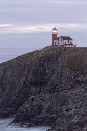 Historic Lighthouse on the Atlantic Coast at sunsetの写真素材