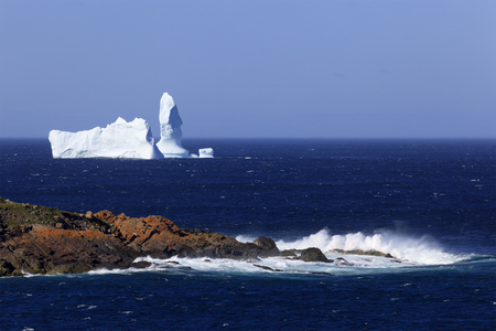 Iceberg drifting along the Newfoundland coastline.の写真素材