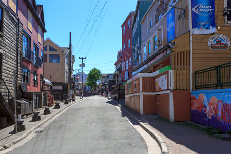 ST.JOHN'S, NEWFOUNDLAND AND LABRADOR, CANADA, JUNE 25, 2017: Famous historic George street bar district popular with visiting tourist , taken on June 25, 2017 in St. John's .のeditorial素材