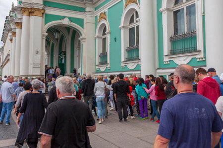 ST. PETERSBURG, RUSSIA - JULY 3, 2018: Tourist waiting to enter the Hermitage museum in a secure and...