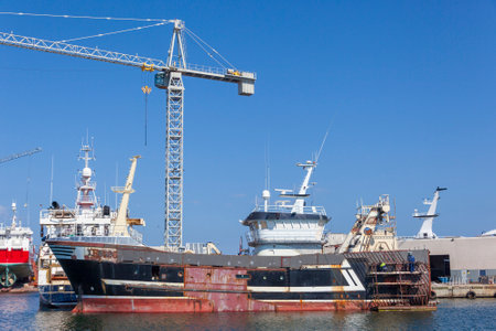 SKAGEN, DENMARK - JULY 07, 2018: Ships being repair at the marina in a fishing port, taken in Skagen...