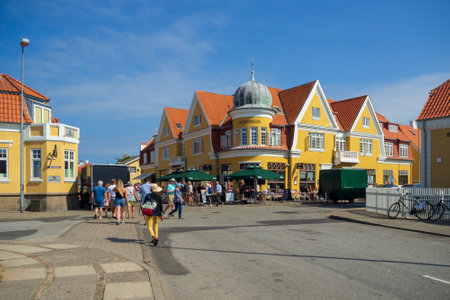 SKAGEN, DENMARK - JULY 07, 2018: The main shopping district in Skagen with its bright yellow buildings, taken in Skagen on July 7.のeditorial素材