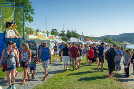 ST. JOHNâS, CANADA, AUGUST 1, 2018: Games of chance entertain fans between boat races at the 200th running of the Royal St. Johnâs Regatta, taken on August 1 in St. Johnâs.のeditorial素材