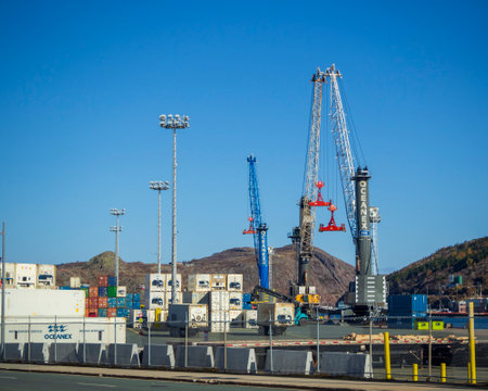 ST. JOHNâS, NEWFOUNDLAND AND LABRADOR, CANADA â OCTOBER 27, 2018: The Oceanex shipping terminal with cranes and containers, taken on October 27 in St. Johnâs.のeditorial素材