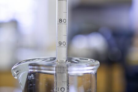 Reading the value from a hydrometer. Used for determining the specific gravity of liquids including beer. の写真素材