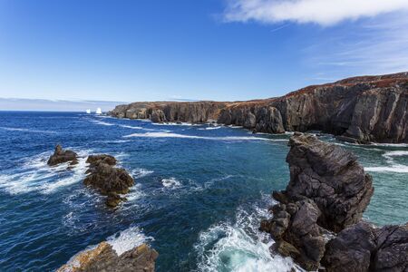 An iceberg along the Newfoundland coastline in summer, very popular with tourist.の写真素材